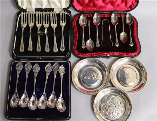 Three cased sets including two silver and three small silver commemorative dishes.